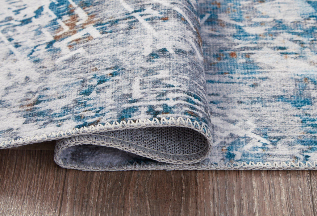 Garyard 5' x 7' Washable Rug - Sigrist Furniture (Sturgis,MI)